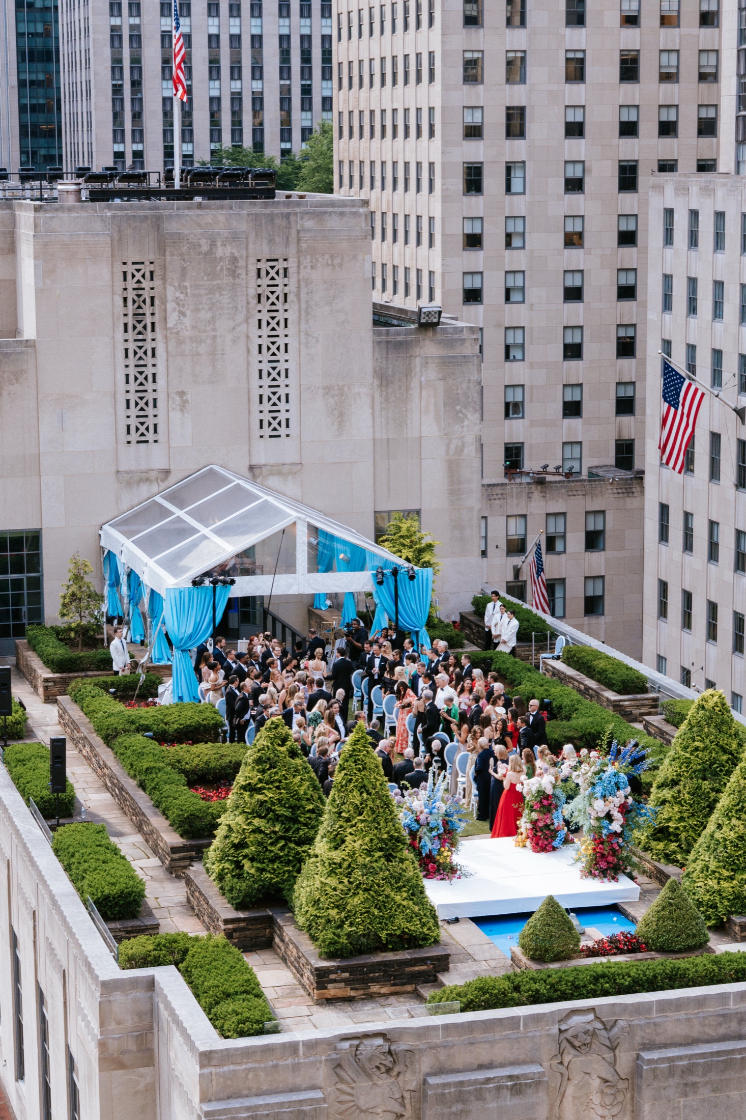 Wedding ceremony from above at 620 Loft and Garden, high over Rockefeller Center